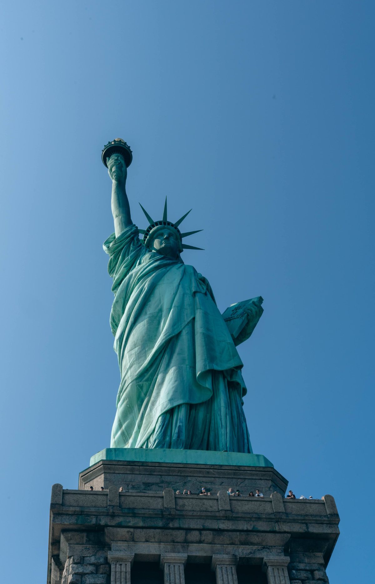 Statue of Liberty against a clear blue sky